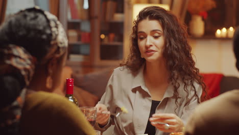 Woman-Having-Dinner-With-Friends